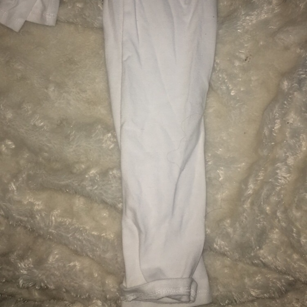 A long sleeve white crop top